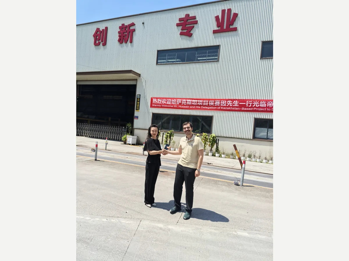 Business cooperation discussion at factory